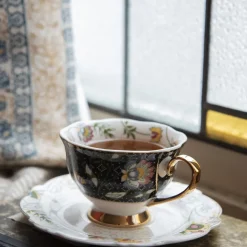 Filiżanka porcelowa kwiaty na czarno-złotym tle 200 ml komplet 2 szt.